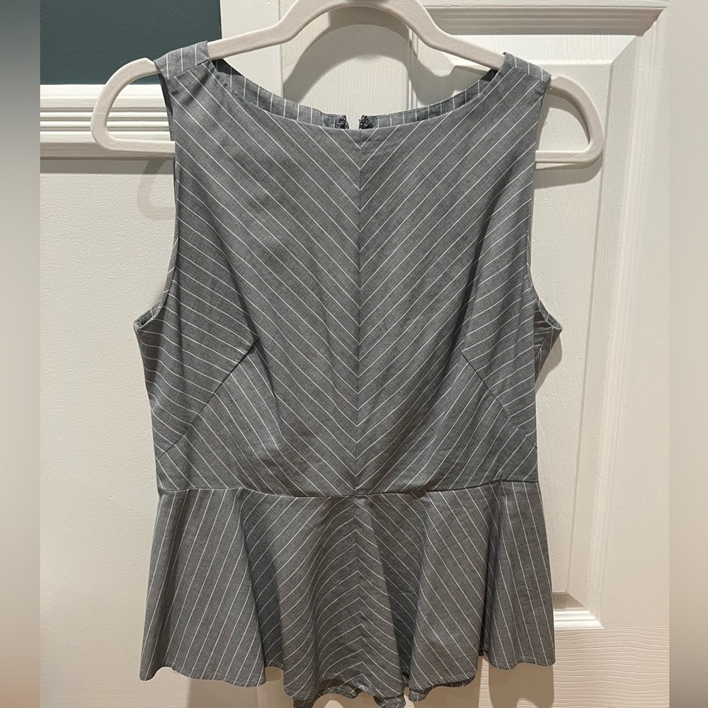 Banana Republic, size 8 (fits more like a smaller medium) peplum top.
